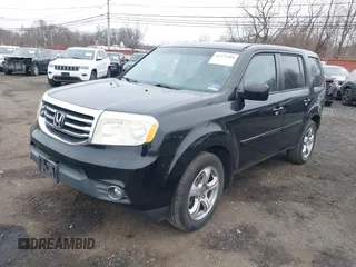 2013 Honda Pilot EX-L with VIN 5FNYF4H71DB021487, listed as a IAAI auction lot 41272308 with 188,217 mi miles and . Bid and sale history available at DreamBid. Image 18.
