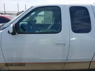 1999 Ford F-150 with VIN 1FTZX1720XKB31945, listed as a IAAI auction lot 42123984 with 187,766 mi miles and . Bid and sale history available at DreamBid. Image 14.