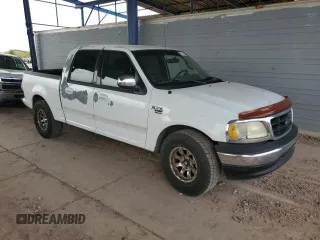 2001 Ford F-150 XLT с VIN 1FTRW07L01KA04562, выставлен на аукционе Copart как лот 52741935 с пробегом 288 598 миль миль и Списание • Salvage title. История ставок и продаж доступна на DreamBid. Изображение 4.