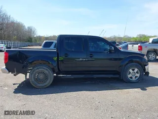 2011 Nissan Frontier PRO-4X with VIN 1N6AD0EV5BC444180, listed as a IAAI auction lot 41943975 with 73,435 mi miles. Bid and sale history available at carsss.com. Image 13.