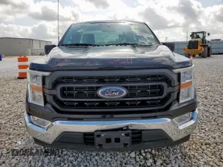 2022 Ford F-150 XL with VIN 1FTMF1C59NKF26135, listed as a Copart auction lot 60034745 with 57,430 mi miles and Salvage title. Bid and sale history available at DreamBid. Image 5.