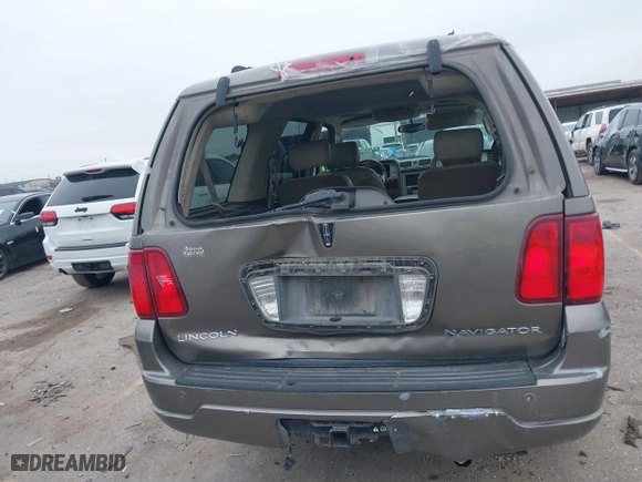2004 Lincoln Navigator Luxury with VIN 5LMFU27RX4LJ41623, listed as a IAAI auction lot 41565114 with 214,590 mi miles. Bid and sale history available at carsss.com. Image 16.