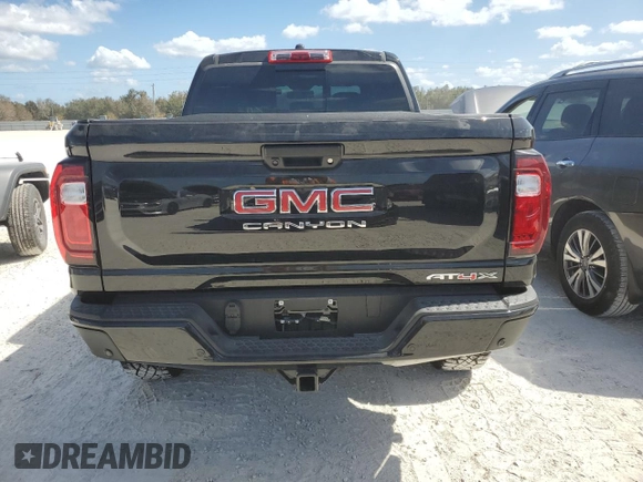 2024 GMC Canyon 4WD AT4X with VIN 1GTP6EEK2R1145665, listed as a Copart auction lot 75542324 with 2,353 mi miles and Non Repairable. Bid and sale history available at carsss.com. Image 6.
