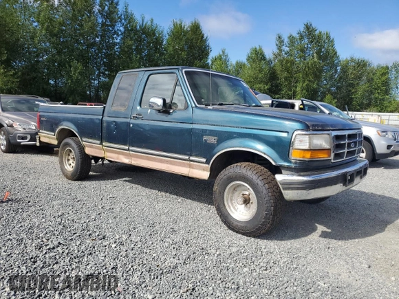 1994 Ford F-150 with VIN 1FTEX14H1RKB75298, listed as a Copart auction lot 64775735 with 227,601 mi miles and Clean title. Bid and sale history available at DreamBid. Image 4.