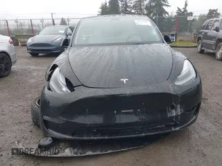 2021 Tesla Model Y Performance z VIN 5YJYGDEF2MF215938, wystawiony jako IAAI lot #41338287 z przebiegiem 63 925 mil mil oraz . Historia ofert i sprzedaży dostępna na DreamBid. Obrazek 11.