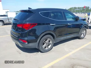 2017 Hyundai Santa Fe 2.4L z VIN 5NMZU3LB4HH024307, wystawiony jako IAAI lot #42147423 z przebiegiem 72 504 mil mil oraz . Historia ofert i sprzedaży dostępna na DreamBid. Obrazek 4.