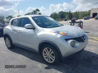 2014 Nissan Juke S with VIN JN8AF5MR5ET351215, listed as a IAAI auction lot 42208852 with 127,340 mi miles. Bid and sale history available at carsss.com. Image 1.