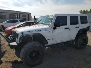 2015 Jeep Wrangler Unlimited Rubicon z VIN 1C4BJWFG1FL750561, wystawiony jako Copart lot #60797075 z przebiegiem 95 677 mil mil oraz Szkoda całkowita • Salvage title. Historia ofert i sprzedaży dostępna na DreamBid. Obrazek 1.