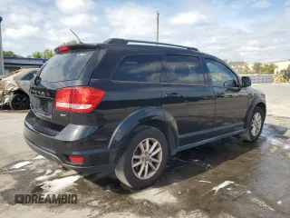 2014 Dodge Journey SXT with VIN 3C4PDCBB5ET198619, listed as a Copart auction lot 54229165 with 167,852 mi miles and Salvage Title. Bid and sale history available at carsss.com. Image 3.