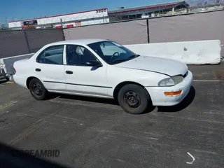 1997 Geo Prizm LSi z VIN 1Y1SK5269VZ446843, wystawiony jako IAAI lot #42521888 z przebiegiem 72 451 mil mil oraz . Historia ofert i sprzedaży dostępna na DreamBid. Obrazek 13.