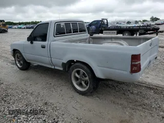 1989 Toyota Pickup DX z VIN JT4RN81PXK0034338, wystawiony jako Copart lot #58797935 z przebiegiem 210 495 mil mil oraz Tytuł czysty. Historia ofert i sprzedaży dostępna na DreamBid. Obrazek 2.