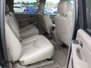 2004 Chevrolet Suburban LT z VIN 1GNFK16ZX4J291419, wystawiony jako IAAI lot #42163331 z przebiegiem 235 054 mil mil oraz . Historia ofert i sprzedaży dostępna na DreamBid. Obrazek 8.