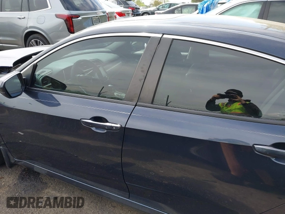 2016 Honda Civic Sedan EX with VIN 19XFC2F7XGE057647, listed as a IAAI auction lot 42016303 with 157,106 mi miles. Bid and sale history available at carsss.com. Image 14.