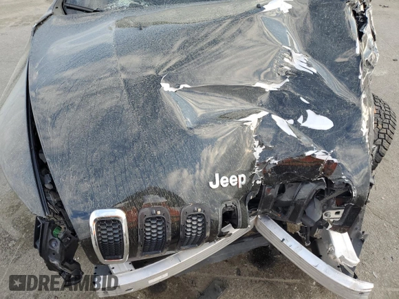 2015 Jeep Cherokee Latitude z VIN 1C4PJMCB0FW744977, wystawiony jako Copart lot #50927835 z przebiegiem 153 430 mil mil oraz Nie do naprawy • Non repairable. Historia ofert i sprzedaży dostępna na DreamBid. Obrazek 12.