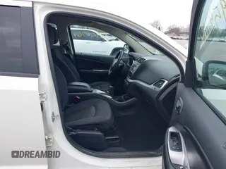 2013 Dodge Journey SXT with VIN 3C4PDCBG9DT564303, listed as a IAAI auction lot 41954764 with 132,125 mi miles. Bid and sale history available at carsss.com. Image 5.