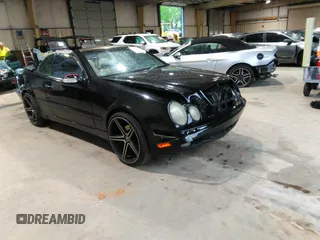 2000 Mercedes-Benz CLK 320/430 z VIN WDBLK65G5YT031236, wystawiony jako IAAI lot #41972975 z przebiegiem 144 665 mil mil oraz . Historia ofert i sprzedaży dostępna na DreamBid. Obrazek 1.