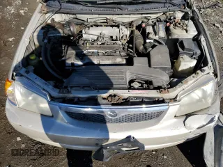 2000 Mazda Protege DX z VIN JM1BJ2220Y0197585, wystawiony jako Copart lot #65309404 z przebiegiem Nie podano mil oraz Nie do naprawy • Non repairable. Historia ofert i sprzedaży dostępna na DreamBid. Obrazek 11.
