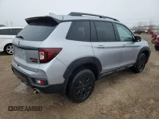 2023 Honda Passport TrailSport with VIN 5FNYF8H64PB044233, listed as a Copart auction lot 53522015 with 10,458 mi miles and Salvage title. Bid and sale history available at DreamBid. Image 3.