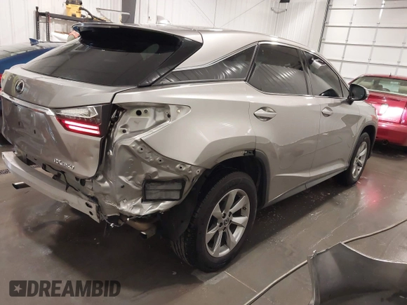 2018 Lexus RX 350 with VIN 2T2BZMCA7JC163886, listed as a IAAI auction lot 42248863 with 57,319 mi miles and . Bid and sale history available at DreamBid. Image 4.