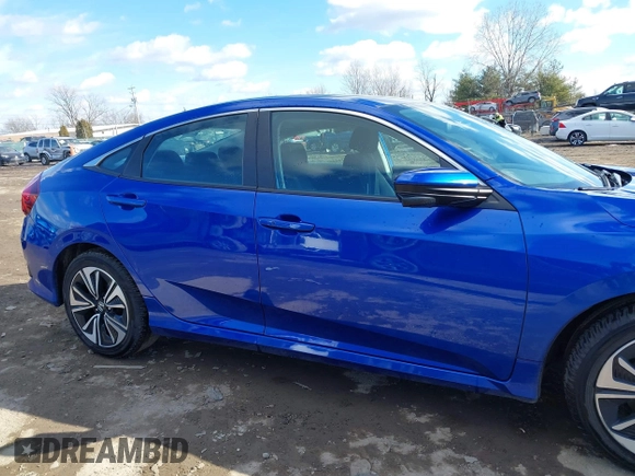 2017 Honda Civic EX-T with VIN 19XFC1E33HE028257, listed as a IAAI auction lot 41395356 with 51,154 mi miles and . Bid and sale history available at DreamBid. Image 13.