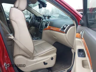 2011 Jeep Grand Cherokee Overland with VIN 1J4RS6GT4BC561169, listed as a IAAI auction lot 41847912 with 220,713 mi miles and . Bid and sale history available at DreamBid. Image 5.