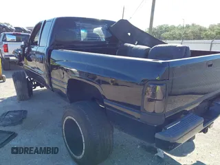 1998 Dodge 1500 with VIN 1B7HF13Z7WJ145413, listed as a IAAI auction lot 42030706 with 198,080 mi miles and . Bid and sale history available at carsss.com. Image 3.