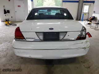 2003 Ford Crown Victoria LX with VIN 2FAFP74W23X134274, listed as a Copart auction lot 73295754 with 212,581 mi miles and Salvage Title. Bid and sale history available at carsss.com. Image 6.