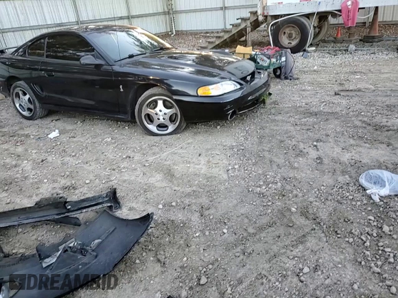 1997 Ford Mustang Cobra with VIN 1FALP47VXVF193303, listed as a Copart auction lot 88025845 with 114,841 mi miles and Salvage Title. Bid and sale history available at carsss.com. Image 11.