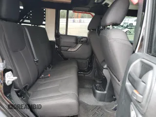 2018 Jeep Wrangler JK Unlimited Sport S with VIN 1C4BJWDG0JL818800, listed as a Copart auction lot 88286715 with 114,011 mi miles and Salvage Title. Bid and sale history available at carsss.com. Image 11.