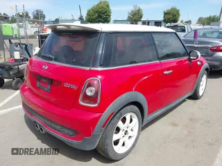 2009 MINI Hardtop S with VIN WMWMF73559TW87548, listed as a IAAI auction lot 42346174 with 132,361 mi miles and . Bid and sale history available at DreamBid. Image 4.