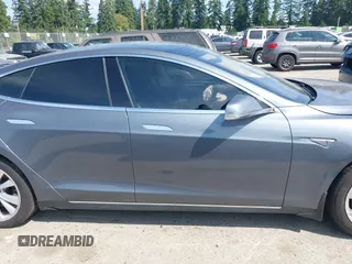 2014 Tesla Model S 60 with VIN 5YJSA1H18EFP38078, listed as a IAAI auction lot 42748619 with 159,285 mi miles and . Bid and sale history available at DreamBid. Image 13.