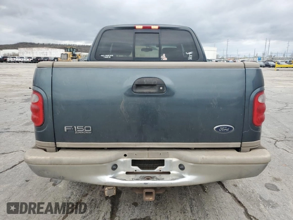 2001 Ford F-150 XLT with VIN 1FTRW07LX1KA18940, listed as a Copart auction lot 50723495 with 133,686 mi miles and Salvage title. Bid and sale history available at DreamBid. Image 6.