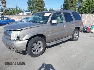 2003 Cadillac Escalade z VIN 1GYEK63N03R155894, wystawiony jako IAAI lot #42336523 z przebiegiem 188 332 mil mil oraz . Historia ofert i sprzedaży dostępna na DreamBid. Obrazek 2.