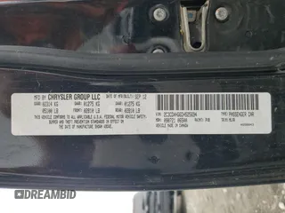2013 Dodge Charger SXT z VIN 2C3CDXHG6DH525694, wystawiony jako Copart lot #54911495 z przebiegiem 189 992 mil mil oraz Szkoda całkowita • Salvage title. Historia ofert i sprzedaży dostępna na DreamBid. Obrazek 13.