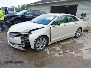 2014 Lincoln MKZ z VIN 3LN6L2G95ER808560, wystawiony jako IAAI lot #42288383 z przebiegiem 97 298 mil mil oraz . Historia ofert i sprzedaży dostępna na DreamBid. Obrazek 2.