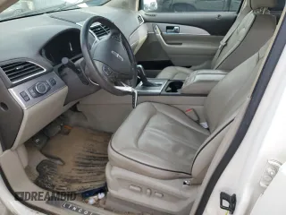 2012 Lincoln MKX z VIN 2LMDJ6JK8CBL06853, wystawiony jako Copart lot #54757735 z przebiegiem 114 046 mil mil oraz Szkoda całkowita • Salvage title. Historia ofert i sprzedaży dostępna na DreamBid. Obrazek 7.
