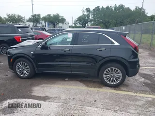 2024 Cadillac XT4 AWD Premium Luxury с VIN 1GYFZDR44RF147956, выставлен на аукционе IAAI как лот 42434595 с пробегом 26 328 миль миль и . История ставок и продаж доступна на DreamBid. Изображение 14.