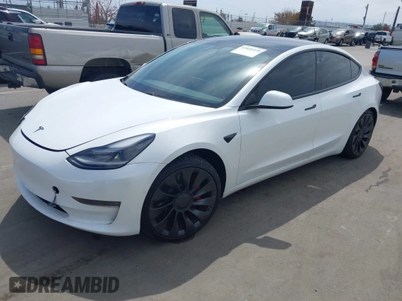 2021 Tesla Model 3 Performance with VIN 5YJ3E1EC2MF084594, listed as a IAAI auction lot 42030339 with 43,215 mi miles and . Bid and sale history available at DreamBid. Image 19.