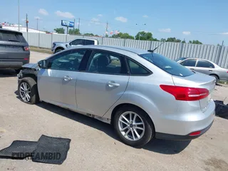 2017 Ford Focus SE with VIN 1FADP3F2XHL256136, listed as a IAAI auction lot 42215479 with 89,945 mi miles and . Bid and sale history available at DreamBid. Image 3.