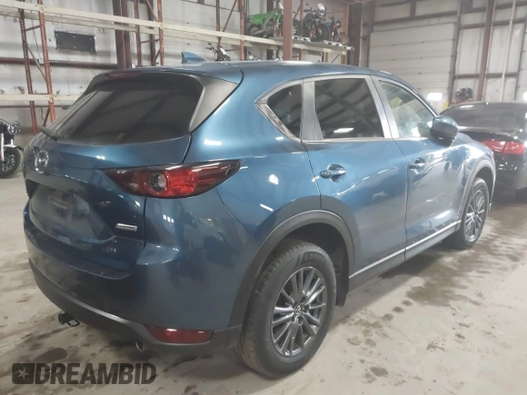2019 Mazda CX-5 Touring with VIN JM3KFBCM1K0584369, listed as a IAAI auction lot 41657765 with 77,934 mi miles. Bid and sale history available at carsss.com. Image 4.