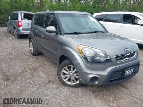 2012 Kia Soul + with VIN KNDJT2A65C7403493, listed as a IAAI auction lot 42095119 with 151,258 mi miles. Bid and sale history available at carsss.com. Image 1.