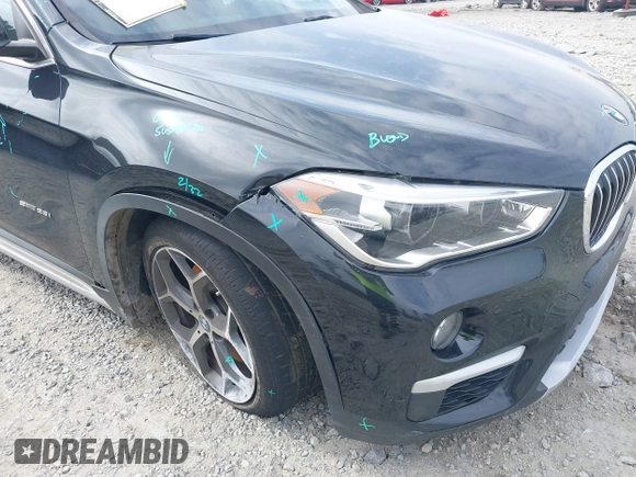 2017 BMW X1 sDrive28i with VIN WBXHU7C36HP924874, listed as a IAAI auction lot 41368396 with 113,443 mi miles. Bid and sale history available at carsss.com. Image 6.