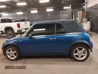 2005 MINI Convertible with VIN WMWRF33555TF63632, listed as a IAAI auction lot 42166640 with 102,559 mi miles and . Bid and sale history available at DreamBid. Image 14.