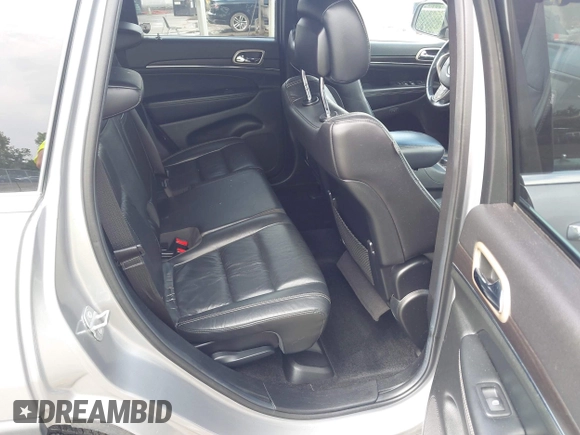 2014 Jeep Grand Cherokee Limited with VIN 1C4RJFBGXEC517832, listed as a IAAI auction lot 42583697 with 107,719 mi miles and . Bid and sale history available at DreamBid. Image 8.