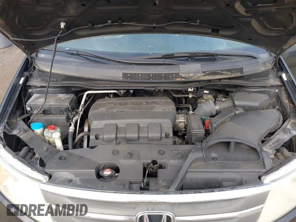 2011 Honda Odyssey EX-L with VIN 5FNRL5H68BB071178, listed as a IAAI auction lot 42286324 with 213,847 mi miles and . Bid and sale history available at DreamBid. Image 10.