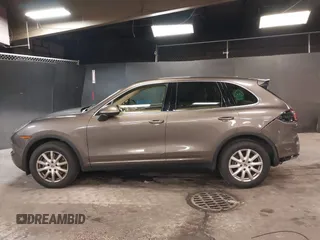2014 Porsche Cayenne with VIN WP1AA2A26ELA93026, listed as a IAAI auction lot 42272409 with 58,951 mi miles and . Bid and sale history available at DreamBid. Image 14.