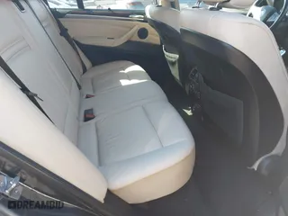 2011 BMW X5 35i with VIN 5UXZV4C51BL740731, listed as a IAAI auction lot 41771257 with 148,638 mi miles. Bid and sale history available at carsss.com. Image 8.