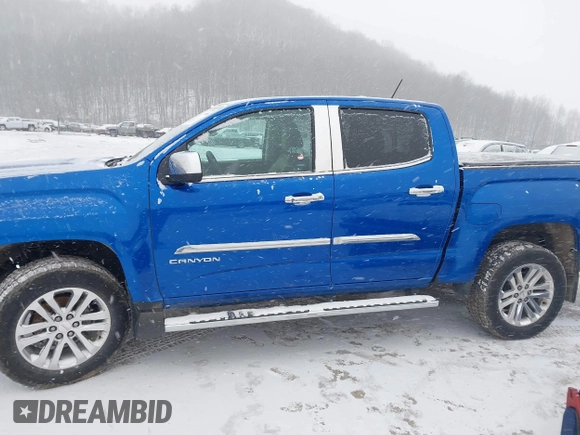 2018 GMC Canyon 4WD SLT with VIN 1GTG6DEN4J1135258, listed as a IAAI auction lot 41591180 with 66,820 mi miles. Bid and sale history available at carsss.com. Image 15.