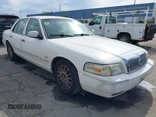 2010 Mercury Grand Marquis LS z VIN 2MEBM7FV4AX618013, wystawiony jako IAAI lot #41652851 z przebiegiem 281 919 mil mil oraz . Historia ofert i sprzedaży dostępna na DreamBid. Obrazek 1.