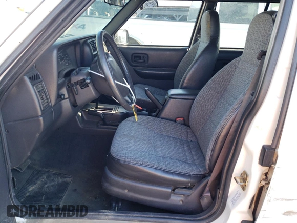 2000 Jeep Cherokee SE with VIN 1J4FF28S5YL243656, listed as a Copart auction lot 71364434 with 222,032 mi miles and Salvage Title. Bid and sale history available at carsss.com. Image 7.